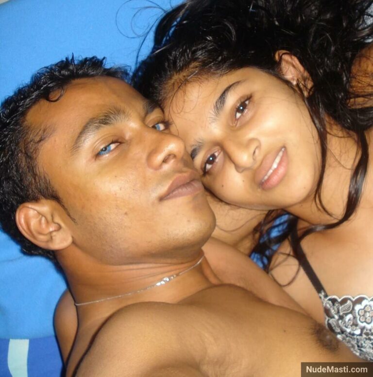 cute indian college girl with lover in bed selfie